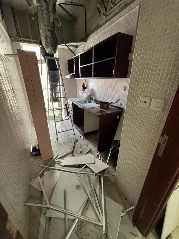 Old kitchen with the ceiling taken down, the space later converted into the bedroom 1 bathroom