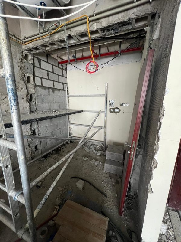 Kitchen area during the works with new blockwork and scaffolding